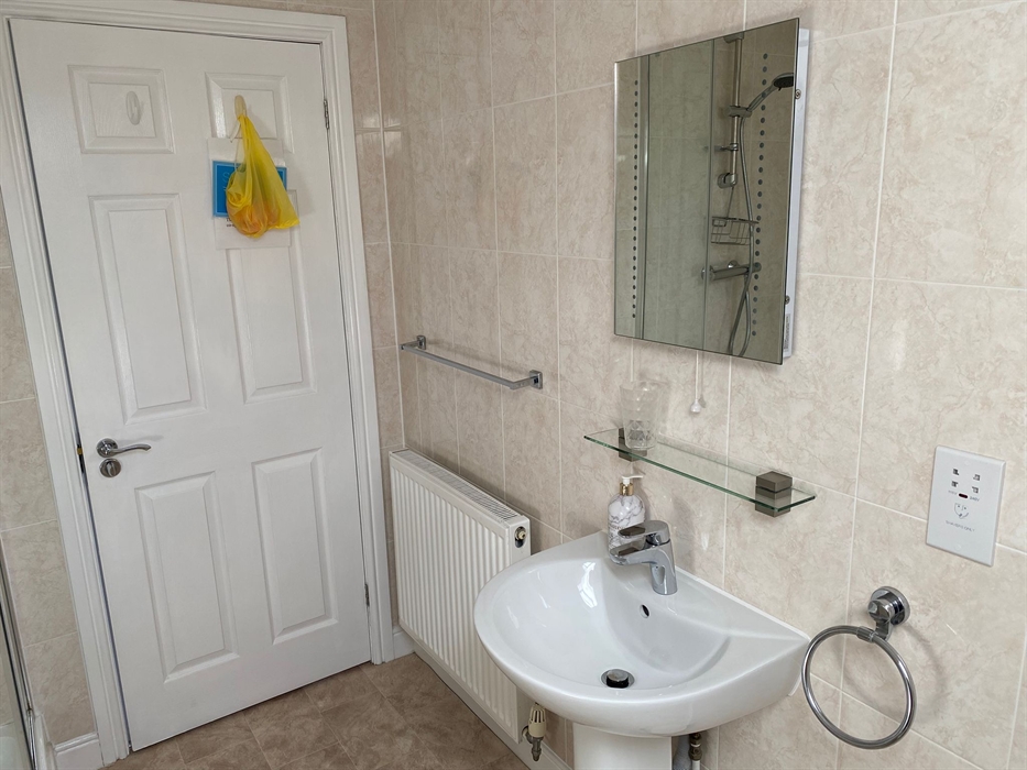First floor bathroom with shower, bath, wash hand basin  and WC