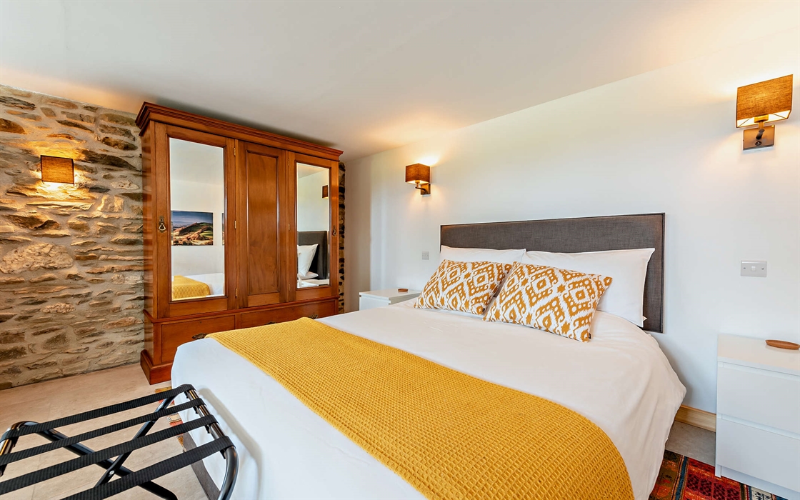 The superking bed has 2000 springs and natural fillings for a comfortable stay in your sustainable accommodation.