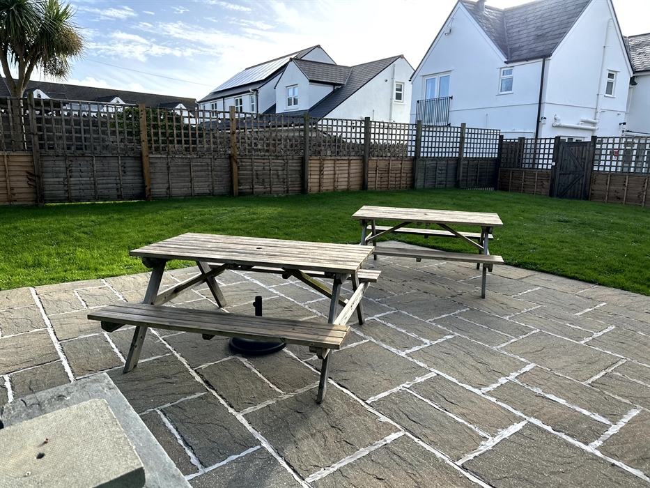 Garden & Patio Area. There is an additional patio area which can  be accessed via the french doors in the living area.