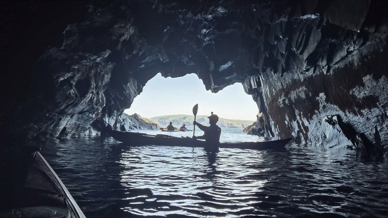 Kayaker inside cave