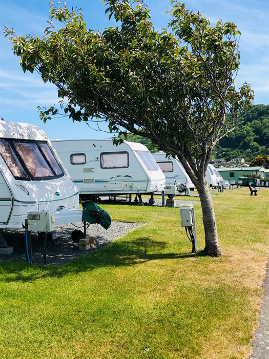 Our long stay touring pitches have fantastic views towards the sea and are very spacious.